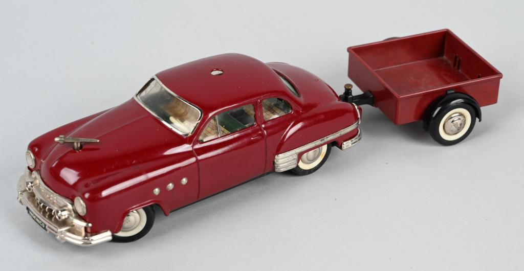 SCHUCO WINDUP INGENICO 5300 CAR & TRAILER: All original windup Car with Trailer. Works. 13" Excellent