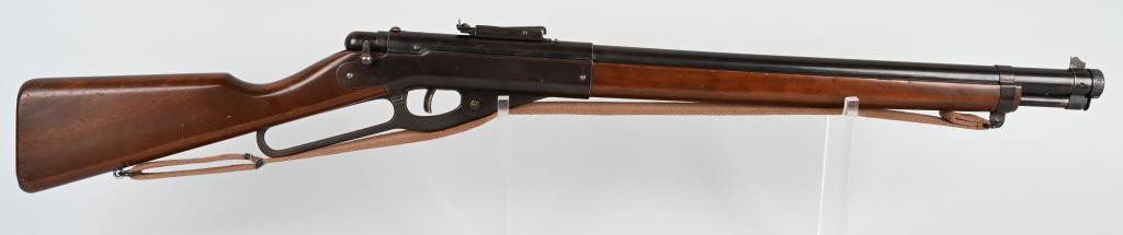 DAISY 1942 DEFENDER MODEL 140 BB GUN: Nice original BB gun with smooth metal and some finish remain. Worked when tested. Made one year only in 1942 with production stopped at about 28,000 due to the war. 35 1/2", Very Good.