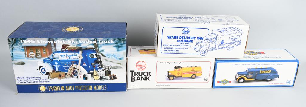 3- MARX TRUCK BANKS & FRANKLIN MINT TRUCK w/ BOX: Lot includes 3 Marx Truck Banks along with a Franklin Mint 1946 Chevrolet Truck. All boxed. Largest is 12". excellent