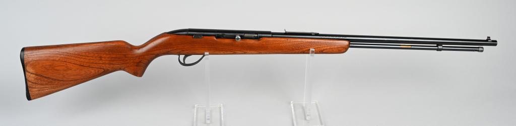 SEARS ( HI-STANDARD) MODEL 25 SEMI-AUTO .22 RIFLE: NSN. BARREL 22". CALIBER .22 RIM FIRE. Made for Sears by Hi-Standard. Features full tube magazine, sporting sights (missing elevator), plain pistol grip walnut stock with plastic butt plate. Metal ret