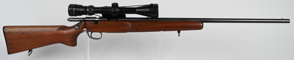 REMINGTON MODEL 521-T BOLT ACTION .22 RIFLE: SERIAL NSN. BARREL 25". CALIBER .22 RIM FIRE. Made from 1947-70. Features both sight slots filled with blanks . Side of frame has a Shooters Edge 3x9 scope attached with Weaver mounts. Scope has stand