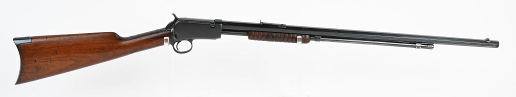 WINCHESTER MODEL 1890 SLIDE ACTION .22 RIFLE: SERIAL 423238. MADE 1910 BARREL 24". CALIBER .22 SHORT. Features a full octagon barrel, 2/3 magazine, sporting sights, take down, blue finish, grooved walnut fore-end, walnut butt stock with rifle but