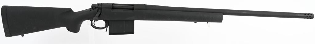 BOXED REMINGTON 700 BOLT ACTION 338 LAPUA RIFLE: SN G7019006. 26" barrel bolt action .338 Lapua Magnum rifle. Remington Model 700 Police model. Features ported barrel, rubber recoil pad, matte black finish, black composite stock, and comes in Reming