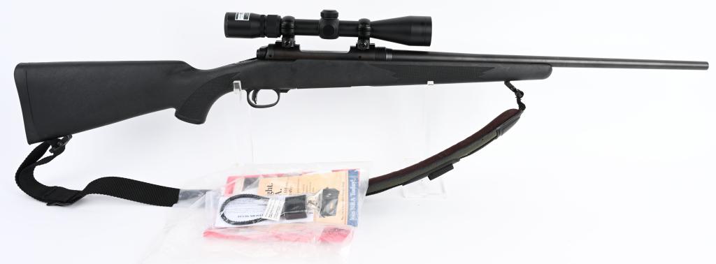 SAVAGE MODEL 11 .223 LEFT HAND BOLT ACTION RIFLE: SN J102065. 22.5" barrel bolt action .223 rifle. Savage Model 11. Features jeweled bolt, polymer stock, and fitted with Nikon scope, nylon sling, and is a left-handed bolt action. Comes with owner's m