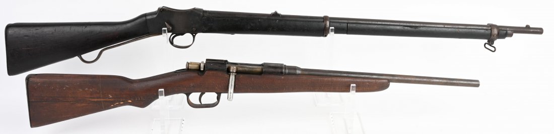 2 VINTAGE MILITARY RIFLES - MARTINI & 6.5mm SPORTR: Pair of vintage military rifles. I - British Martini Henry rifle. Antique. SN 6106. 33" barrel, .455 caliber, with bayonet lug and British proofs on the lever. Fair condition. II - Military rifle, SN 