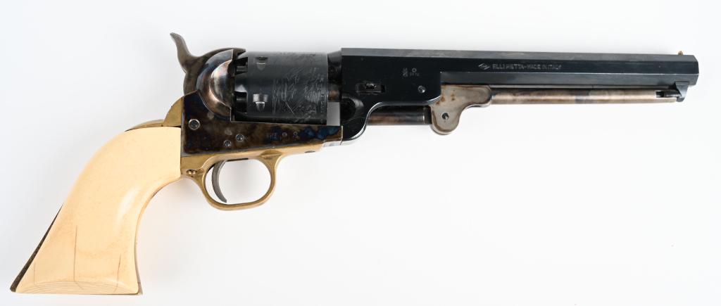 ITALIAN COPY COLT 1851 NAVY REVOLVER: Pietta copy with octagon barrel, six shot, .36 caliber with blue and case finish and faux ivory grips that could use better fitting. No signs of being fired, just handling marks and some age freckles.