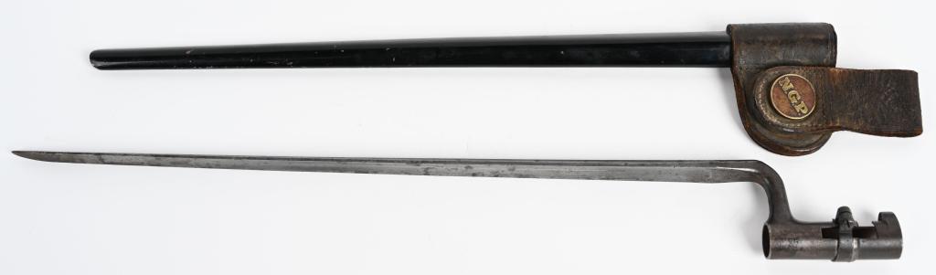 US TRAPDOOR SPRINGFIELD BAYONET NGP SCABBARD: 45-70 N.G.P. (National Guard of Pennsylvania?) bayonet, scabbard, & frog 21 inch overall bayonet, 18.5 inch scabbard, 4 inch leather and brass frog. Very god condition with light oxidation and paint l