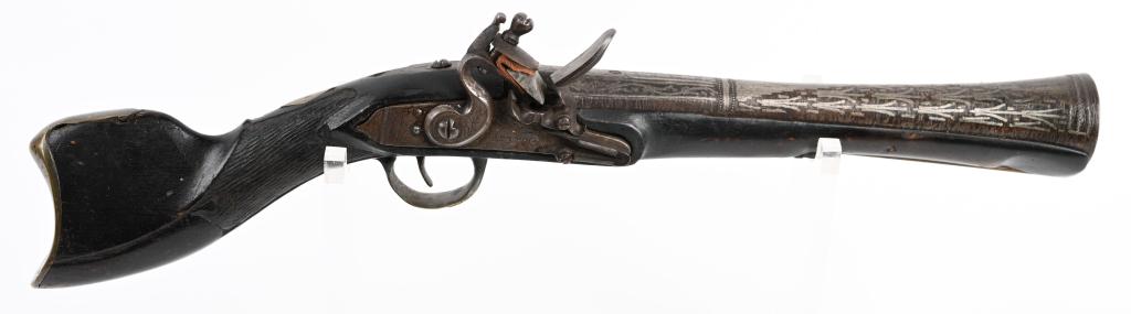 SILVER MOUNTED MIDDLE EASTERN BLUNDERBUSS PISTOL: This is a hand held pistol that features a 11" barrel completely covered in silver inlays. Flintlock is marked. Deep touch mark stamp on barrel. Brass furniture. Nicely toned and not cleaned. Total le