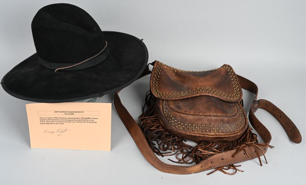 SAM HOUSTON SHOOTING BAG & HAT REPLICA: Black powder shooting bag in the form of a leather bag with brass studs and leather tassels. Bag contains takedown tools, flints, and other black powder shooting accessories. Identified as 4 in a seri