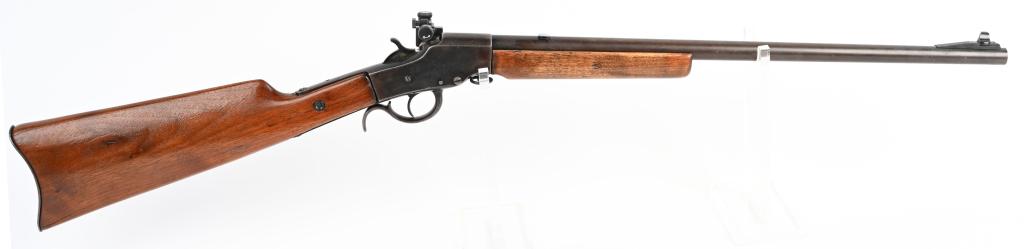 HOPKINS & ALLEN SINGLE SHOT .22 RIFLE: NSN. BARREL 20". CALIBER .22 RIM FIRE. A ramp front sight and a Redfield receiver sight have been added. Rear stock sanded and varnished and does not fit with some minor cracks at toe. Barrel is brown