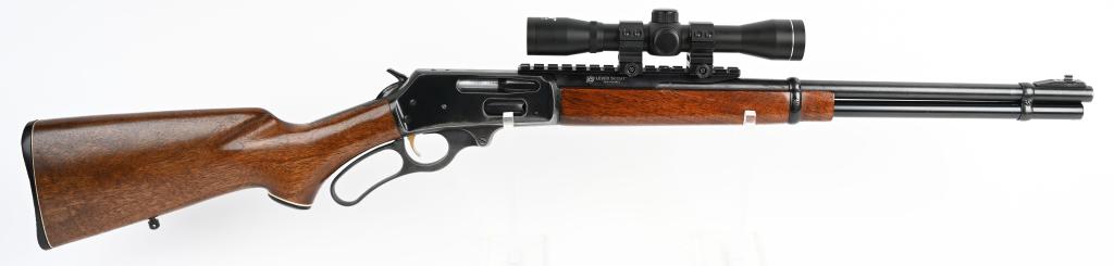 MARLIN MODEL 336 LEVER ACTION RIFLE: SERIAL Y42936. BARREL 20". CALIBER 35 REMINGTON. Features full magazine, ramp front sight, rear sight removed and rail installed, blue finish, walnut stock. Sling eye missing from band. Carry wear on 