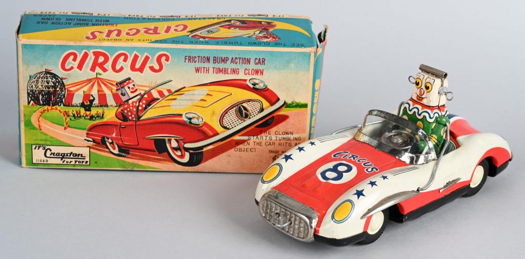 ATC Tin Friction CIRCUS CLOWN ROBOT CAR w/ BOX: Great looking Clown Robot driving tin friction car. When the car bumps into something the Clown is thrown from the car. All original with great colors. Action works. Comes with scarce box. 8 1/2" Exce