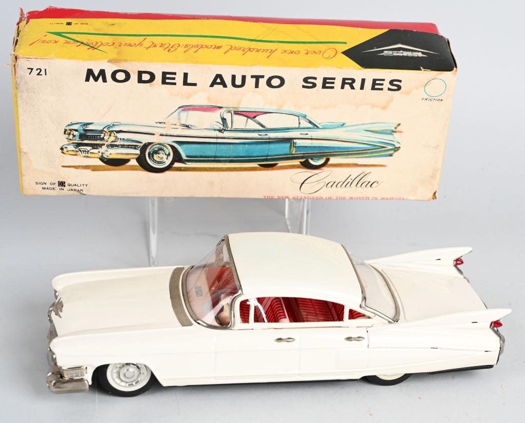 BANDAI Tin Friction CADILLAC SEDAN w/ BOX: Great looking tin friction Cadillac Sedan. Looks never played with condition. Friction works. Boxed 11" Excellent (From the Danny Kubert Collection)