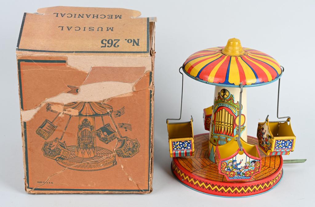 CHEIN Tin Windup AERO SWING w/ BOX: Colorful tin windup Aero Swing. All original and complete. Windup works. With partial box. 10" Excellent