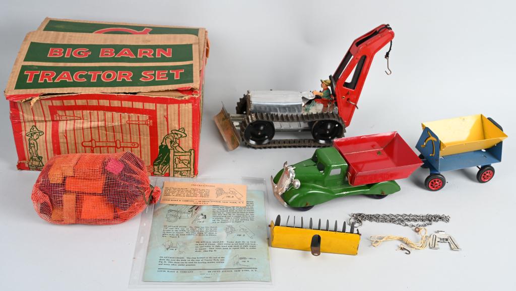 MARX BIG BARN TRACTOR & TRUCK SET w/ BOX: Scarce 1930's Marx toy toy that includes a Pressed steel dump truck with side dump trailer, unused wood truck load, along with a windup tractor with tow winch, plow and disc harrow. The set includes a