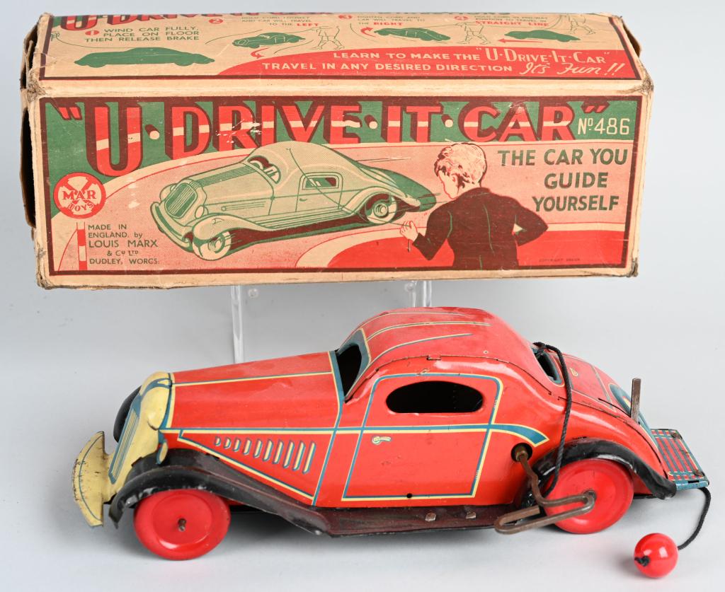MARX Tin Windup U DRIVE IT CAR w/ BOX: "RARE" Marx tin windup U Drive It Car. All original including sting with ball to control the car. Car is key wind and has on/off switch. Windup works. Comes with original Box with early Marx logo. We 
