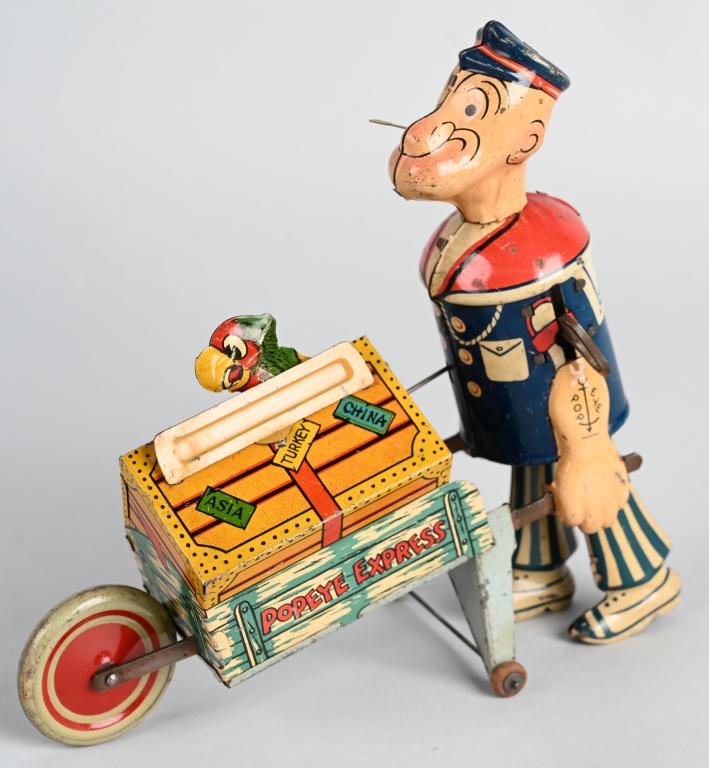 MARX Tin Windup POPEYE EXPRESS w/ MOVING PARROT: Great all original Popeye Express. Scarce moving parrot version. Very nice colors. Windup works. 9" Excellent