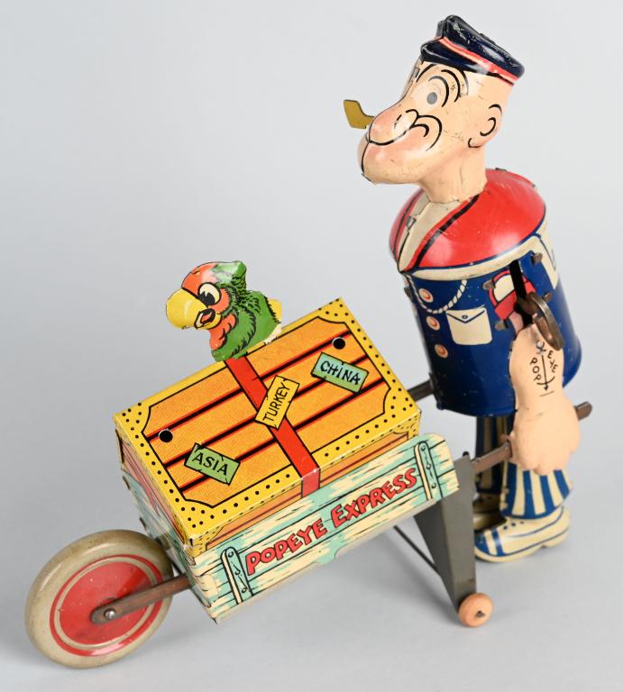MARX Tin Windup POPEYE EXPRESS w/ PARROT: Wonderful early Popeye toy. Version with stationary parrot. This toy looks near never played with condition. Colors are bright and glossy. Windup works. A very nice example. 8" Excellent