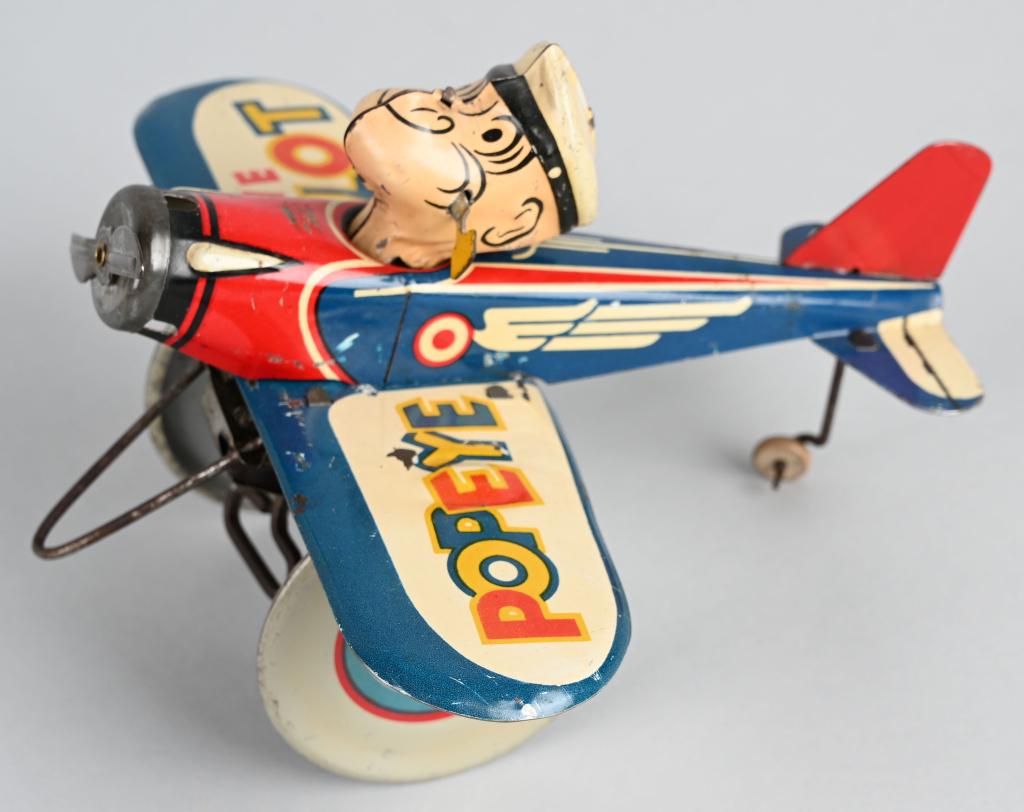 MARX Tin Windup POPEYE THE PILOT: Nice colorful Popeye toy. All original and complete. Windup works. 8" Excellent