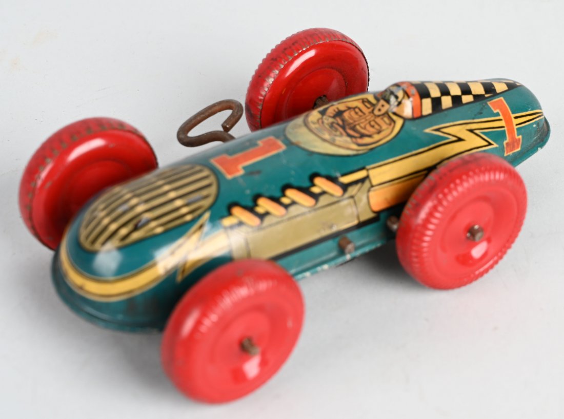 MARX PROTOTYPE TIN WINDUP RACE CAR: Nice Marx Prototype. Normal Marx race Car but this version has Driver lithoed right on the car, not a separate piece like the normal production Race Car. Car has working windup mech. No production mar