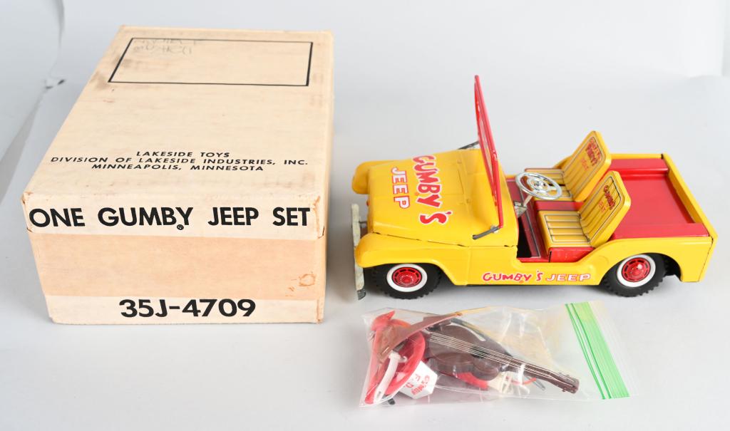 LAKESIDE TIN GUMBY'S JEEP w/ BOX: New Old Stock Gumby's Jeep. Great tin litho Jeep with Gumby on it. Comes with original accessory Guitar, Fire Hat, Fire Tools, and More. Boxed 10" Excellent-Near Mint