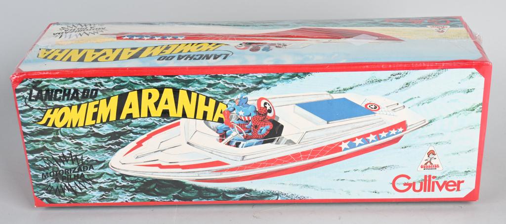 GULLIVER SPIDERMAN & CAPTAIN AMERICA BOAT MIB: "RARE" New Old Stock Gulliver Spiderman and Captain America "Lancha Do Homem Aranha". Motorized Super Hero boat made in Brazil. Mint sealed in the box with factory cello. Box has great images of Spide
