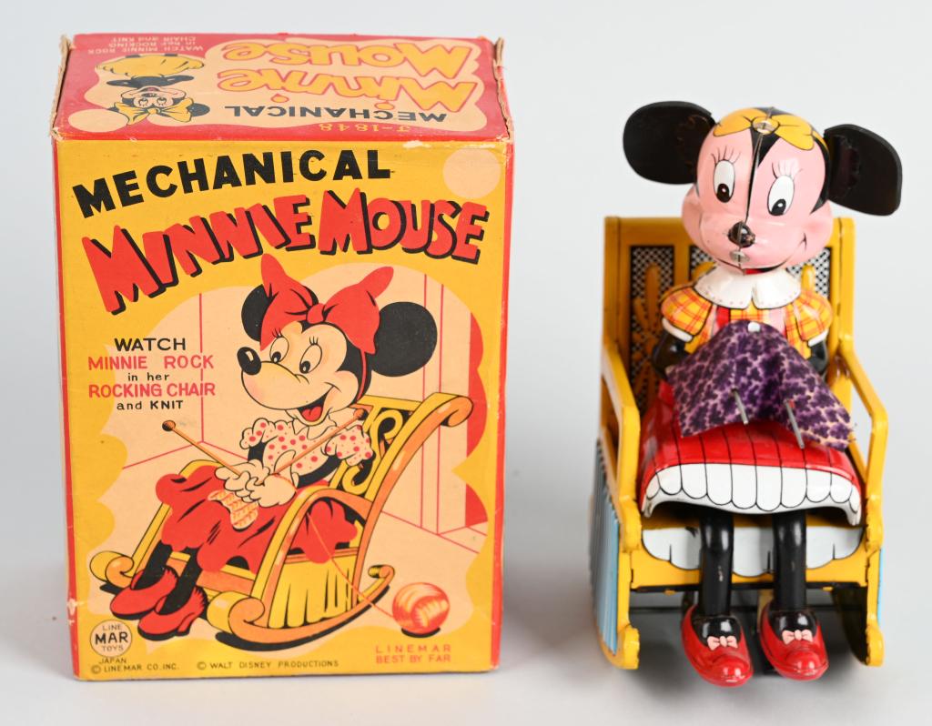 LINEMAR TIN WINDUP MINNIE MOUSE KNITTER W/ BOX: Great tin windup Disney toy. All original with great colors. Windup works. Looks never played with. Boxed. 7" Excellent