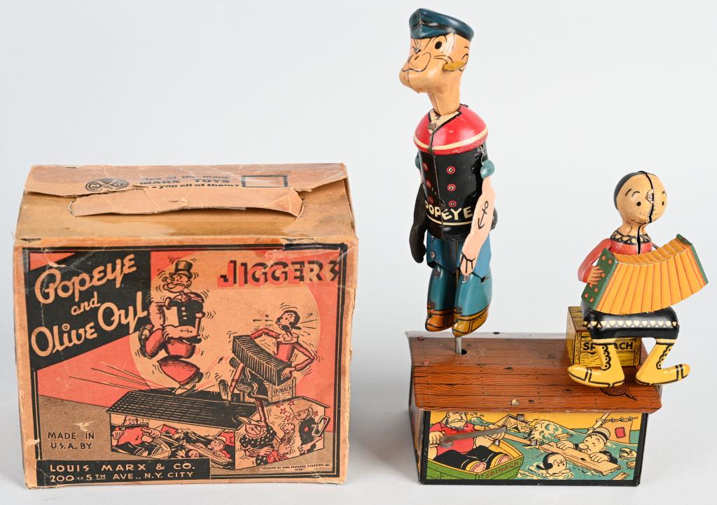 MARX Tin Windup POPEYE & OLIVE OYL JIGGERS w/ BOX: Very nice early Popeye toy. All original and complete. Great colors and graphics. Windup works. Comes with box. 9 1/2" Excellent