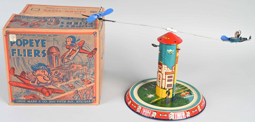 MARX Tin Windup POPEYE FLIERS w/ BOX: Outstanding Marx Popeye Fliers. All original and in never played with condition. Popeye and Olive Oyl fly around the tower. Colors and graphics are beautiful Windup works. Comes with very nice origina