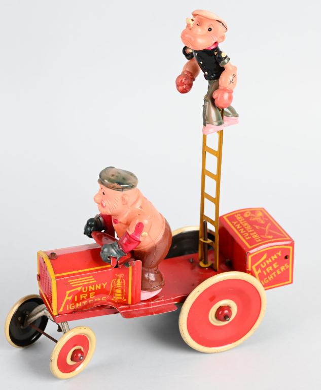 MARX Windup POPEYE & BLUTO FUNNY FIRE FIGHTERS: Great Marx tin and celluloid windup Popeye and Bluto Funny Fire Fighters. All original with great colors. Popeye figure head is slightly pushed down at the neck. Did not mess with it , but looks like 