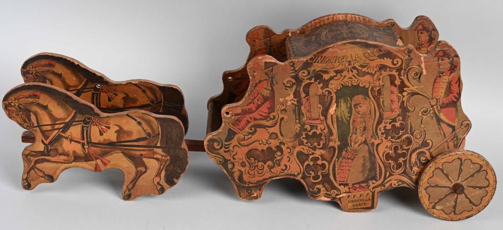 REED CINDERELLA COACH: "RARE" Reed Cinderella Coach. Paper on wood coach drawn by 2 horses. Roof removes and has 2 original alphabet blocks. Coach has very beautiful litho all around with nice details. All original conditio