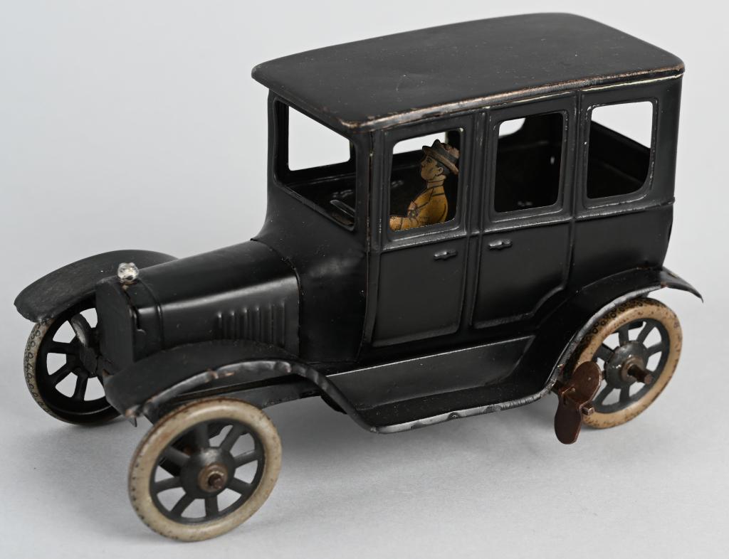 BING TIN WINDUP MODEL T SEDAN: All original and complete with male driver. Windup works. 6 1/2" Excellent