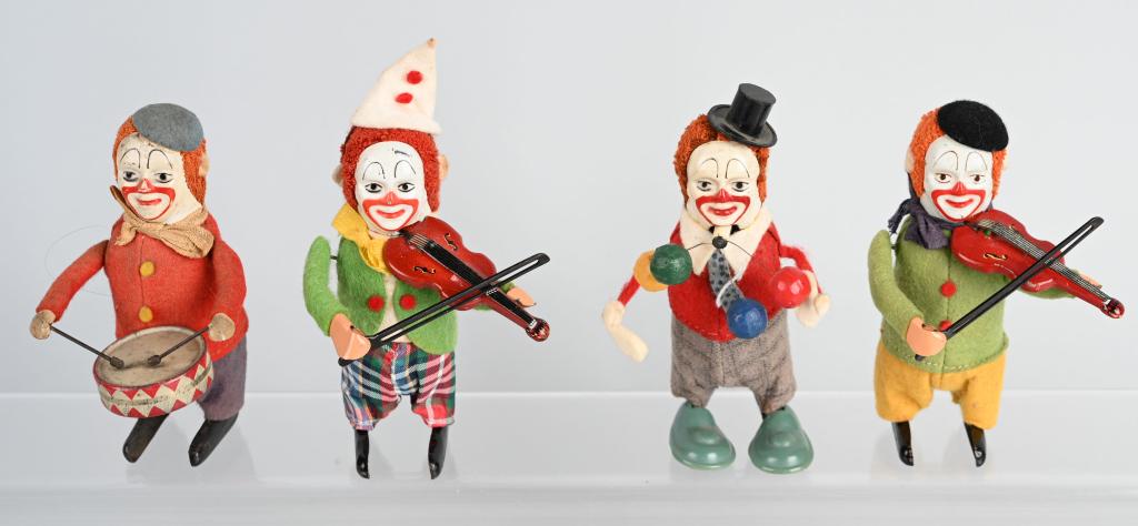 4- SCHUCO WINDUP CLOWNS: Nice lot of windup Clowns. All original and working. 4 1/4" Excellent