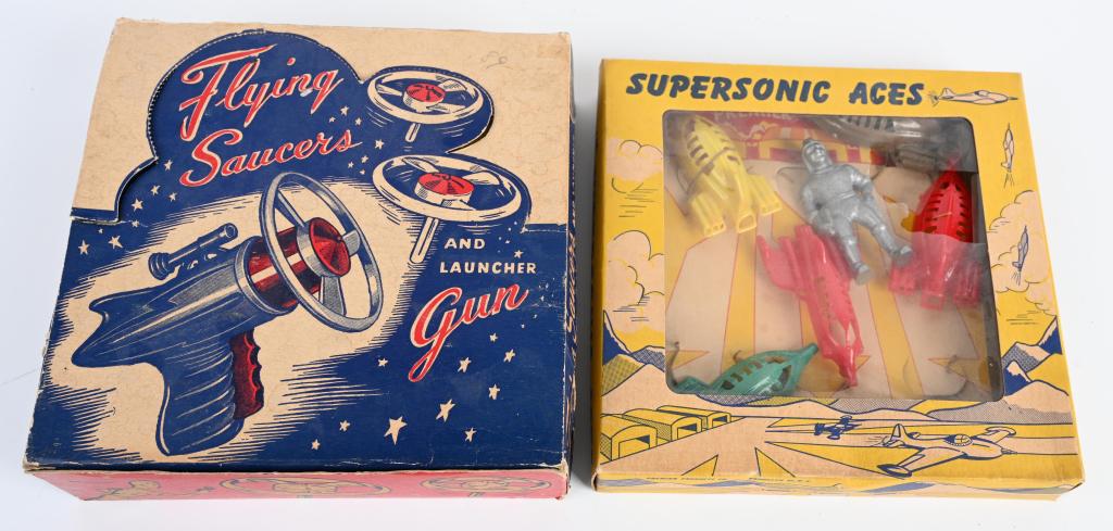 FLYING SAUCER GUN & SPACESHIP SET MIB: Includes Flying Saucer Gun and Supersonic Aces Spaceship Set. Both New Old Stock in Boxes. Largest 7 1/2" Excellent (From the Danny Kubert Collection)