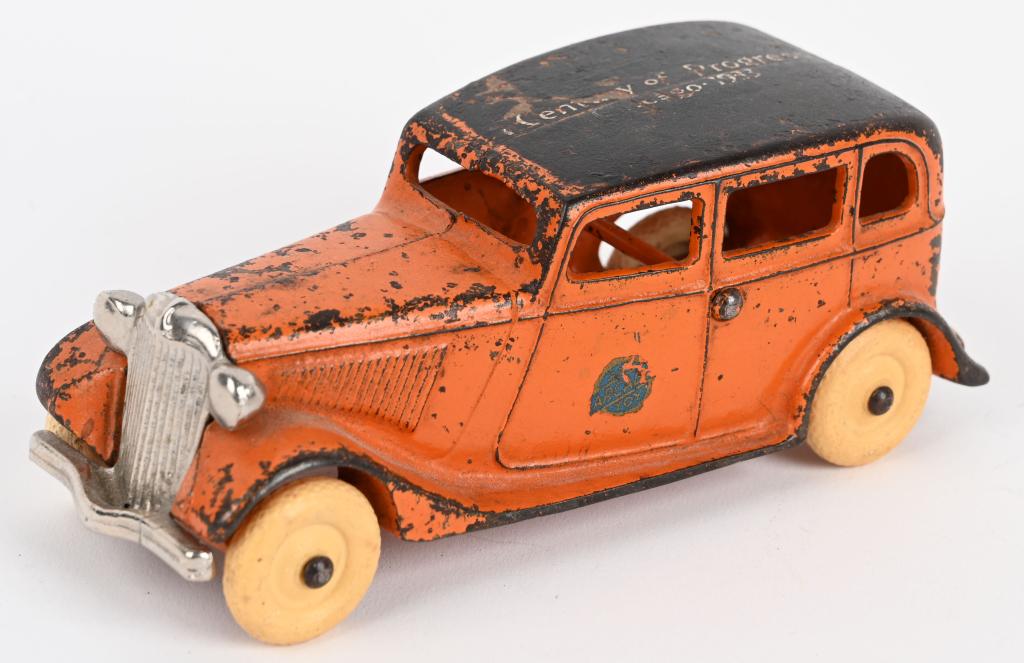 ARCADE cast iron 1933 CHICAGO WORLD'S FAIR SEDAN: Great looking Arcade cast iron toy that was a souvenir from the 1933 Century of Progress Chicago World's Fair. This is the larger version that measures 6 1/2". The grill and 2 rubber tires are correct