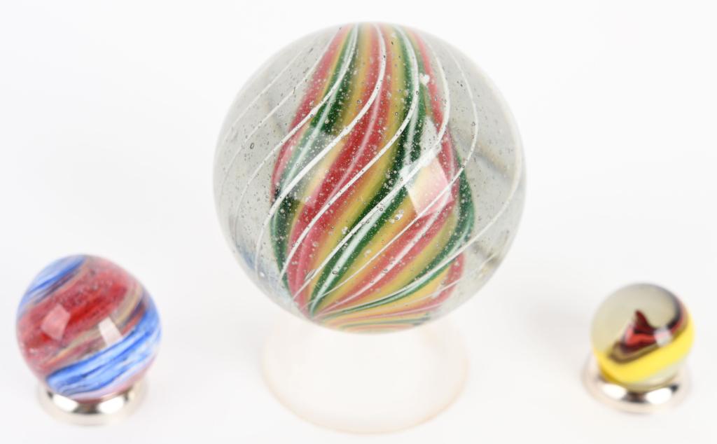 3-POLISHED MARBLES: Largest 1-13/16". Nice marbles with polished. Display very nicely.