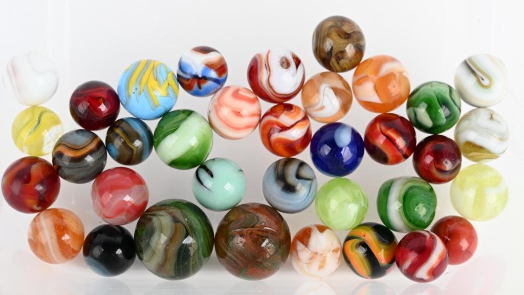 Lot of Assorted Christensen Agate Marbles: Nice assortment of Christensen marbles. Many hard to find color combinations, some flames and transparent swirls. mint- to nm