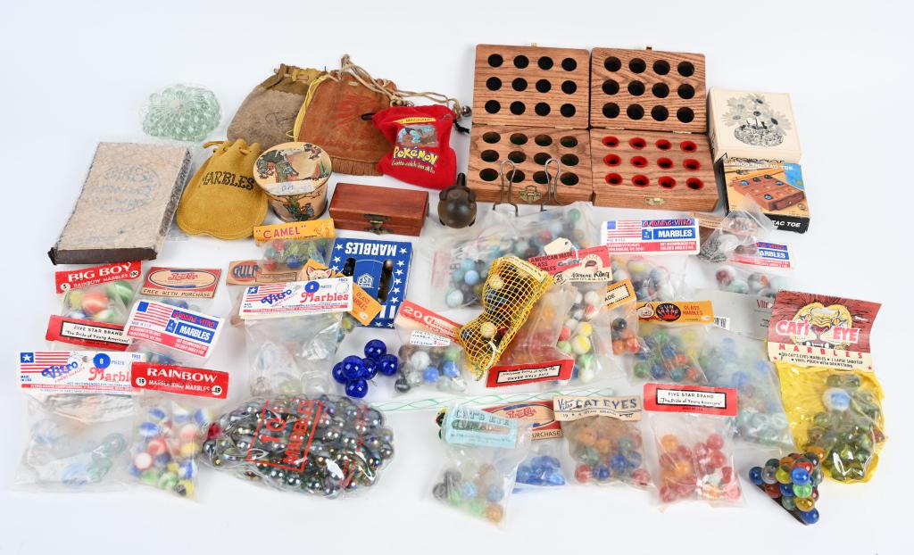 LARGE LOT MARBLES & RELATED ITEMS: Lot includes 20+ original marble bags by various companies, wood marble display cases, and other marble related items. Condition varies. Good-Excellent