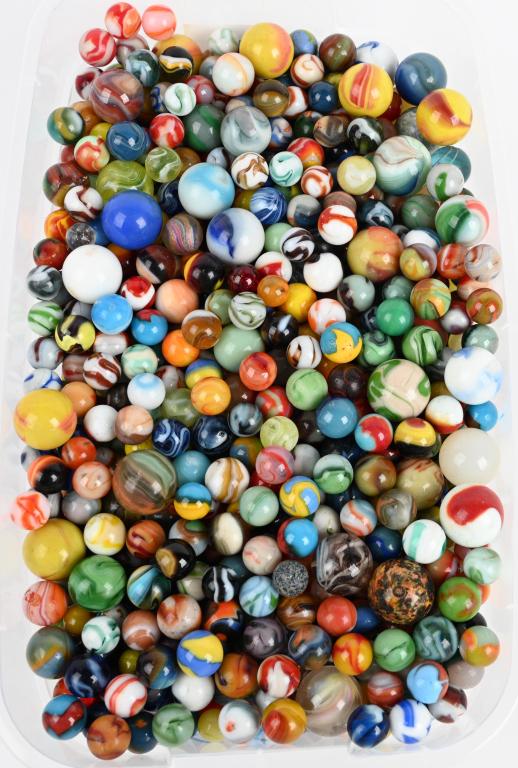 LARGE LOT OF VINTAGE & MODERN MARBLES: Lot includes about 900 marbles including machine made from early 1900's to modern. Also included are some hand made marbles. Sixes are 7/16" to 1 7/16". Very Good-Excellent