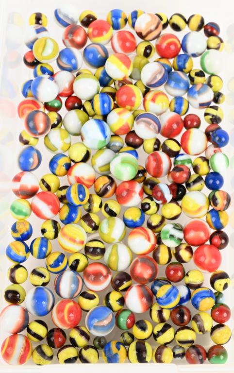 180+ MARBLE KING MARBLES: The lot includes about 184 Marble King marbles measuring 7/16" to 7/8" diameter. Selection includes bumble bee, wasp. tiger, spiderman and watermelon. Excellent