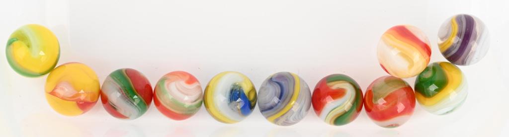 11- AKRO AGATE POPEYE MARBLES: Lot includes 2 purple and yellow, 2 green and yellow, 4 red and green, 2 yellow and red, and one blue and yellow. Size 9/16" to 5/8", Excellent