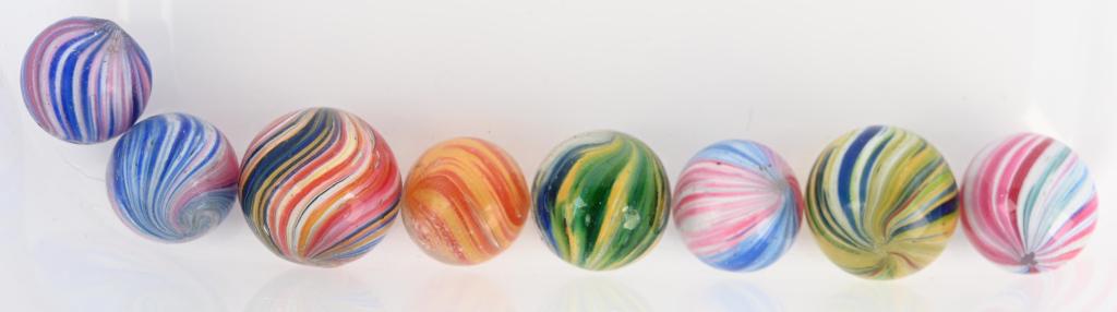9- ONIONSKIN MARBLES: Nice lot of multi color onionskin marbles. Size 19/32" to 25/32", Excellent