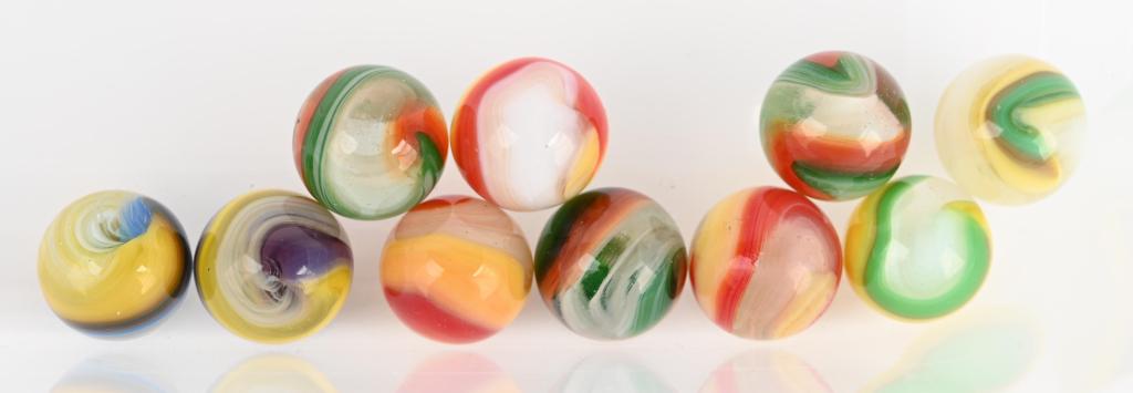 10- AKRO AGATE POPEYE MARBLES: Lot includes a purple and yellow, a baby blue and yellow, 2 green and yellow, 3 red and yellow and 3 red and green. 5/8" diameter. Excellent