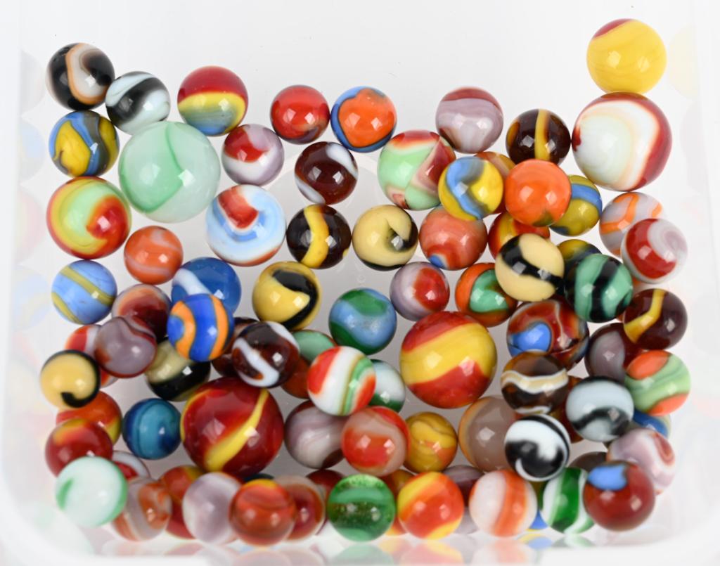 80+ AKRO AGATE CORKSCREW MARBLES: Nice lot of about 86 one, two and three color corkscrews. Size 9/16" to 63/64" diameter. Very Good-Excellent