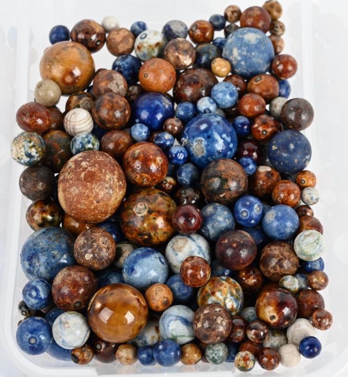LARGE LOT OF POTTERY MARBLES, BENNINGTONS & MORE: Lot of about 390 pottery marbles includes brown, blue,a n decorated Benningtons, Lined Crockeries and Chinas. Size 7/16" to 1 1/2" diameter. Very Good-Excellent