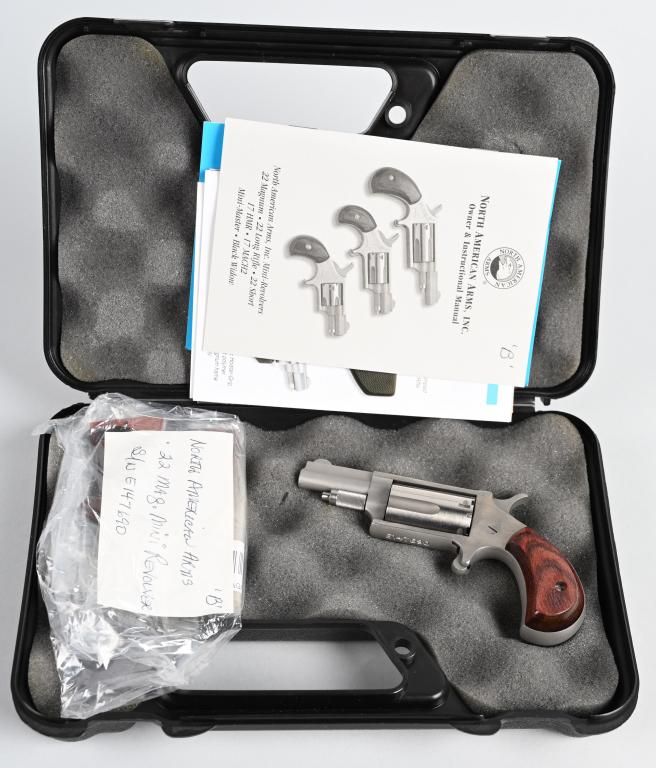 BOXED NORTH AMERICAN ARMS MAGNUM DERRINGER: SERIAL E147690. BARREL 1.5". CALIBER .22 MAG. Made of stainless steel and features a five shot fluted cylinder, single action, spur trigger with fixed front sight and birds head wood grips. Gun appear