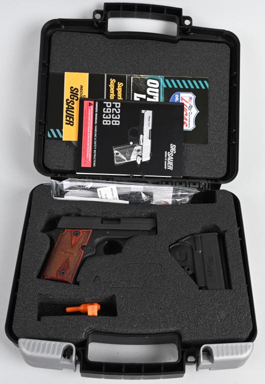 BOXED SIG SAUER MODEL P238 SEMI AUTO PISTOL: SERIAL 27B24497. BARREL 2.5". CALIBER .380 ACP. Small back up pistol with a Colt Mustang profile in matte finish with alloy frame, white dot sights, checkered wood grips, bobbed hammer, single action 