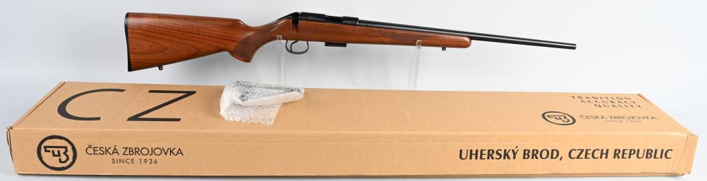 BOXED CZ 455 BOLT ACTION 22 WMR RIFLE: SERIAL B411056. BARREL 21" CALIBER .22 WMR. Checkered grip, no sights, grooved receiver for a weaver scope mount. comes in factory original cardboard box with matching SN and specs of this gun on the 