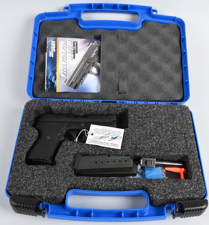 BOXED SIG SAUER MODEL P239 SEMI AUTO PISTOL: SERIAL 58U009263. BARREL 3.5". CALIBER .357 SIG. Features include matte finish, white dot combat sights, double action, alloy frame and two barrels, one in .357 Sig and one in .40 S&W. Comes in case w