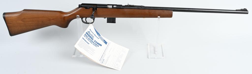 MARLIN MODEL 25MN BOLT ACTION RIFLE: SERIAL 08602112. BARREL 22". CALIBER .22 WIN MAG RF. This gun features blue finish with sporting sights, magazine fed with one included, plain hardwood pistol grip stock and plastic butt plate. Gun is